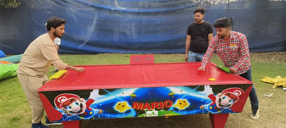Air hockey game table ready for party guests in Jaipur