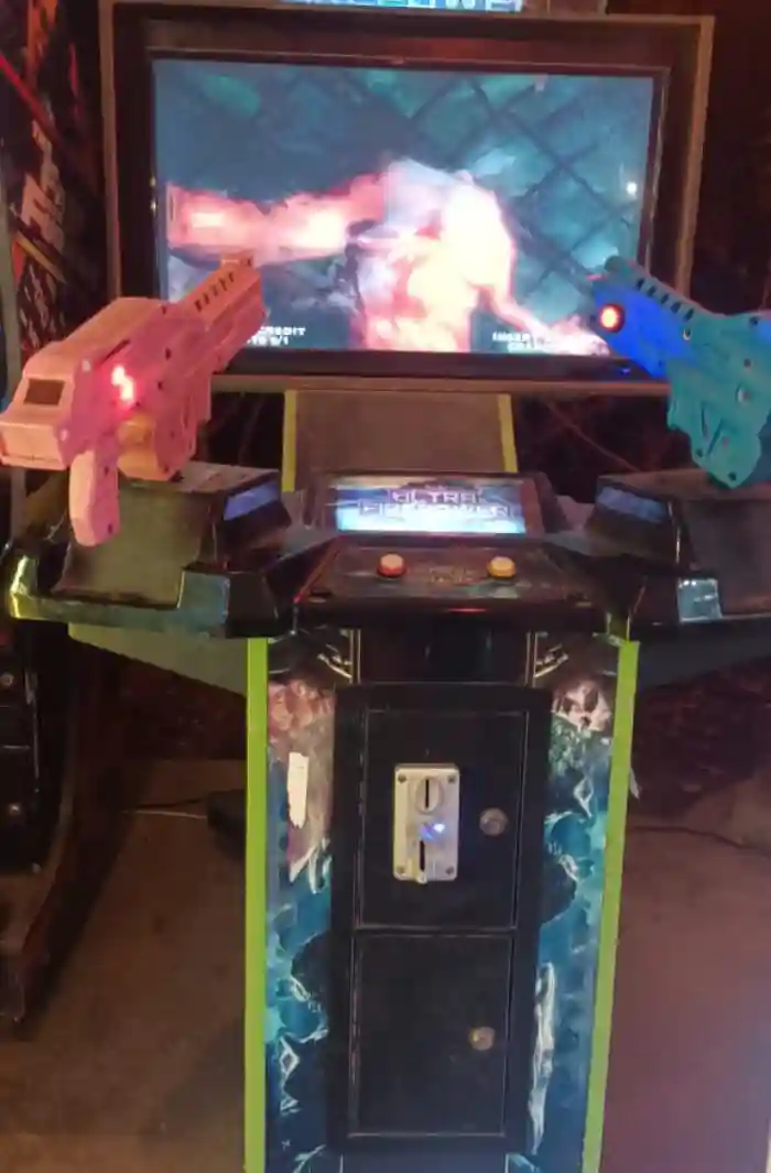 Guest playing alien shooter game at a Mumbai celebration