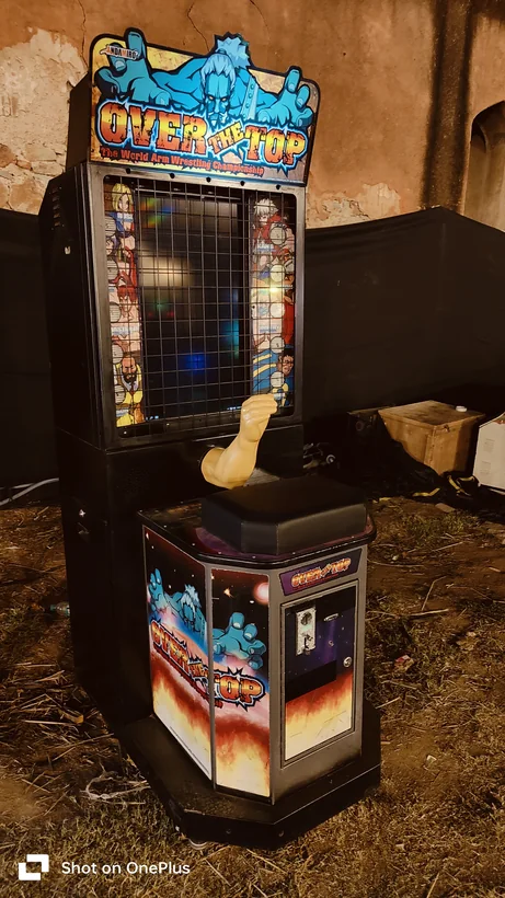 Arm wrestling arcade machine close-up with event lighting in Gurgaon