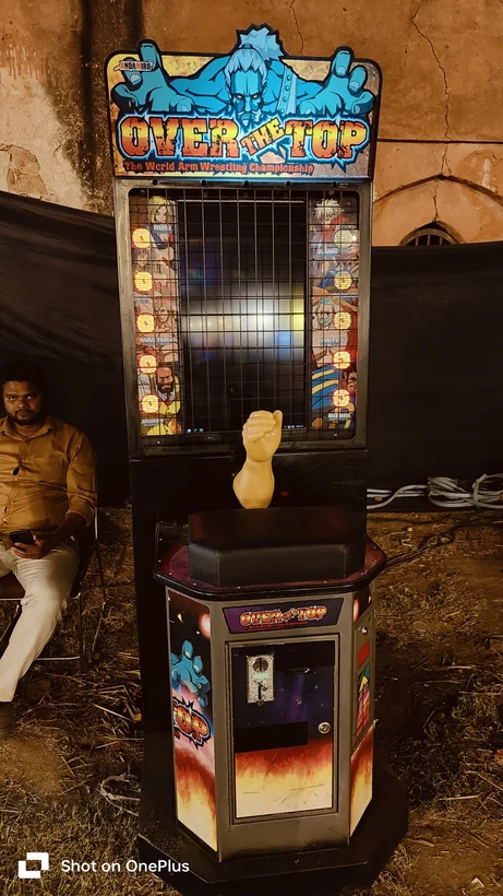 Front view of the arm wrestling arcade game ready for play in Gurgaon
