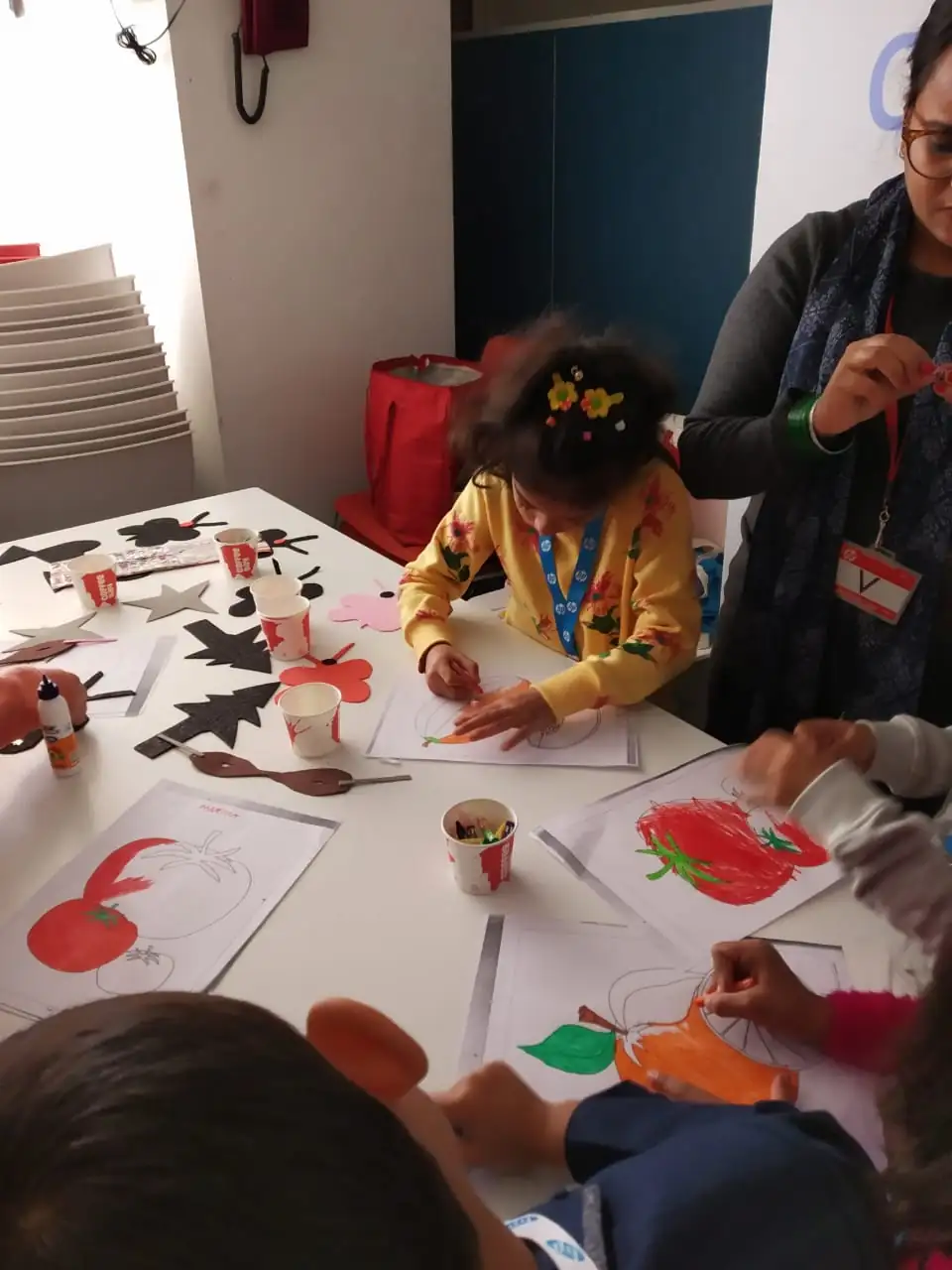 Supervised drawing and colouring activity for children