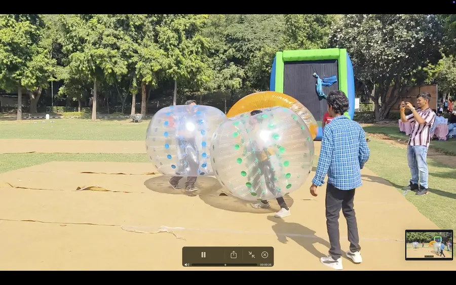 Guests enjoying body zorbing during a Kanpur celebration