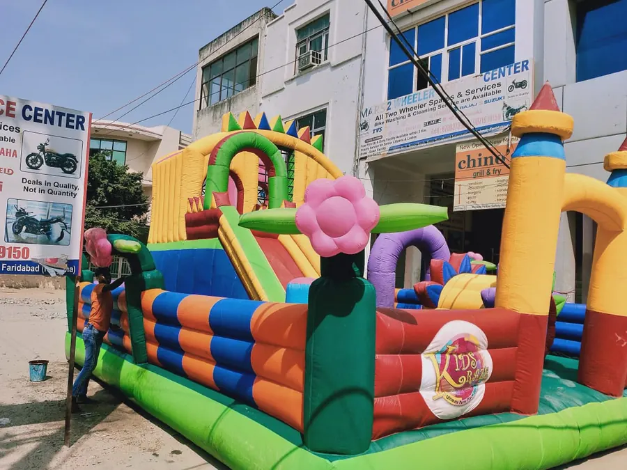 Guests enjoying bouncy game during a Goa celebration