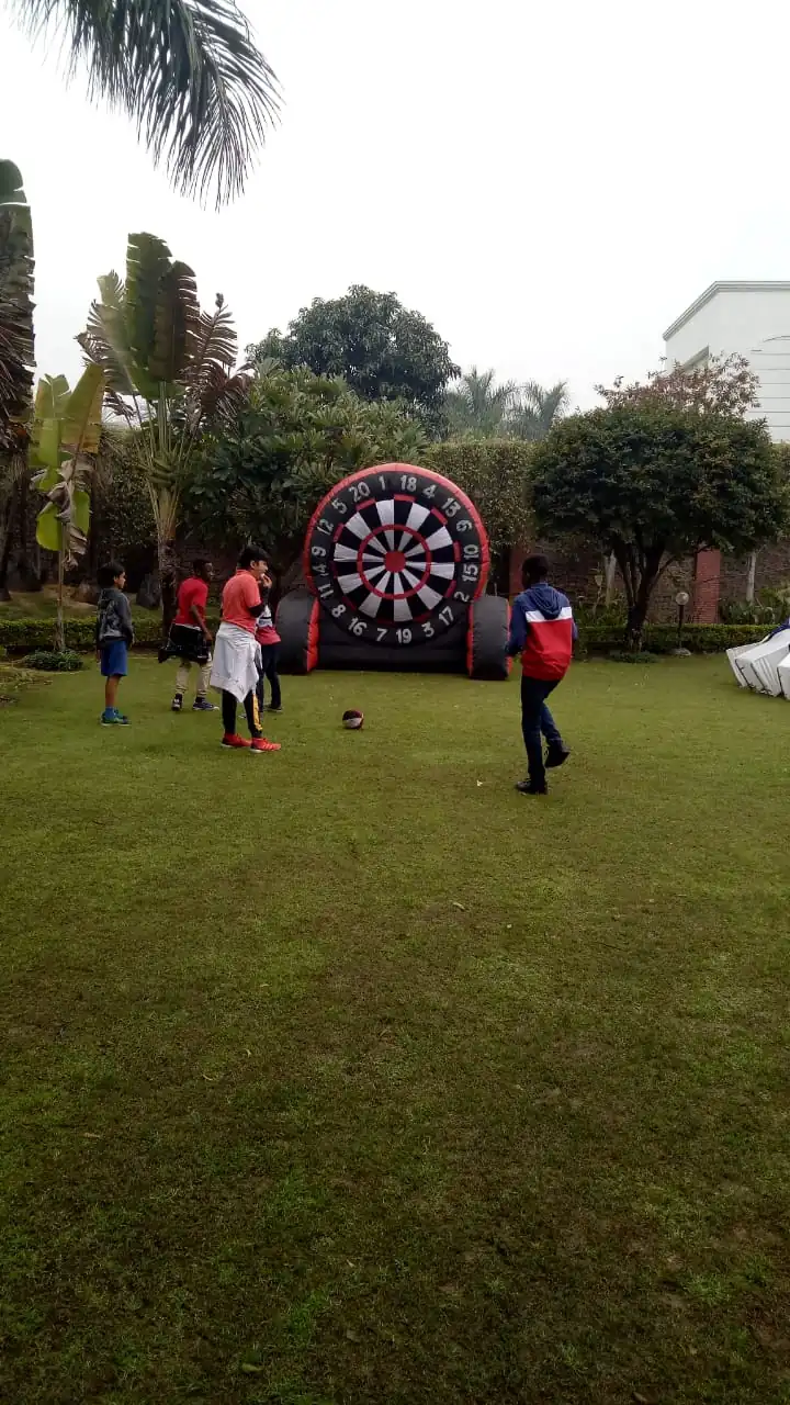 Children participating in a Foot Dart activity in Mumbai