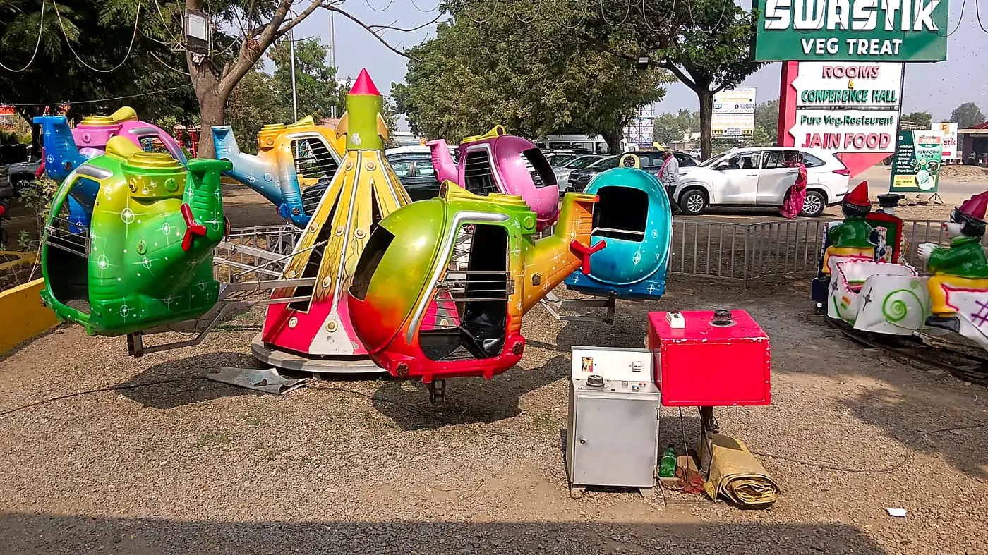 Colourful children’s aeroplane merry-go-round ride for a Mumbai event