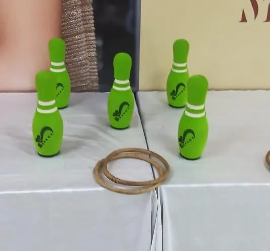Guests enjoying ring toss game during a Mumbai celebration