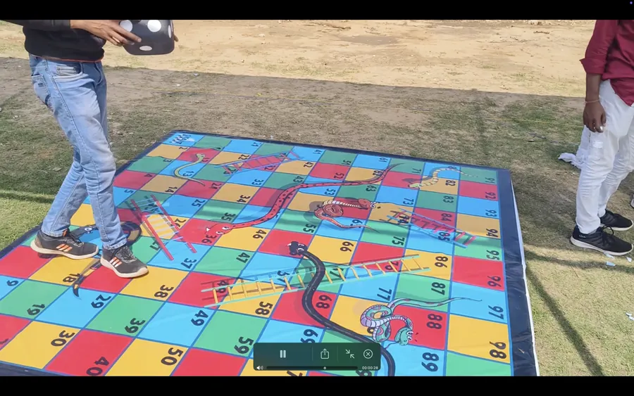 Event-ready snake and ladder game setup by Page One Memories in Mumbai